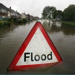 Torrential Rain Threatens Further Flooding...TEWKESBURY, UNITED KINGDOM - JULY 21:  A flood sign warns of flooded areas following the torrential rain in the last 24 hours, July 21, 2007, in Tewkesbury, England. Flash flooding has caused severe disruption across the UK with more bad weather forcasted.  (Photo by Matt Cardy/Getty Images)